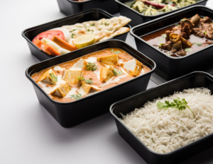 The hidden dangers of black plastics showcased in black plastic containers.