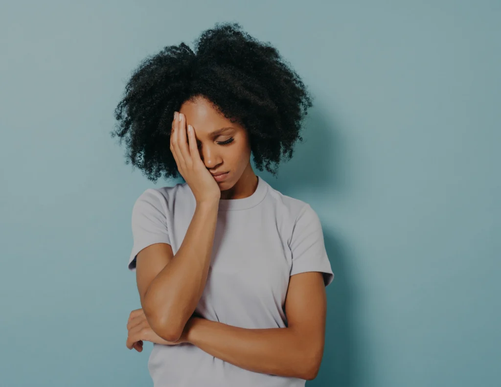 Woman experiencing stress and fatigue